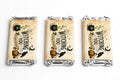Three thick Halloween chocolate bars in vintage Witching You sleeves, front view