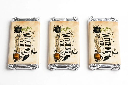 Three thick Halloween chocolate bars in vintage Witching You sleeves, front view