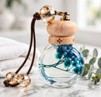 Perfume bottle on a marble bathroom counter