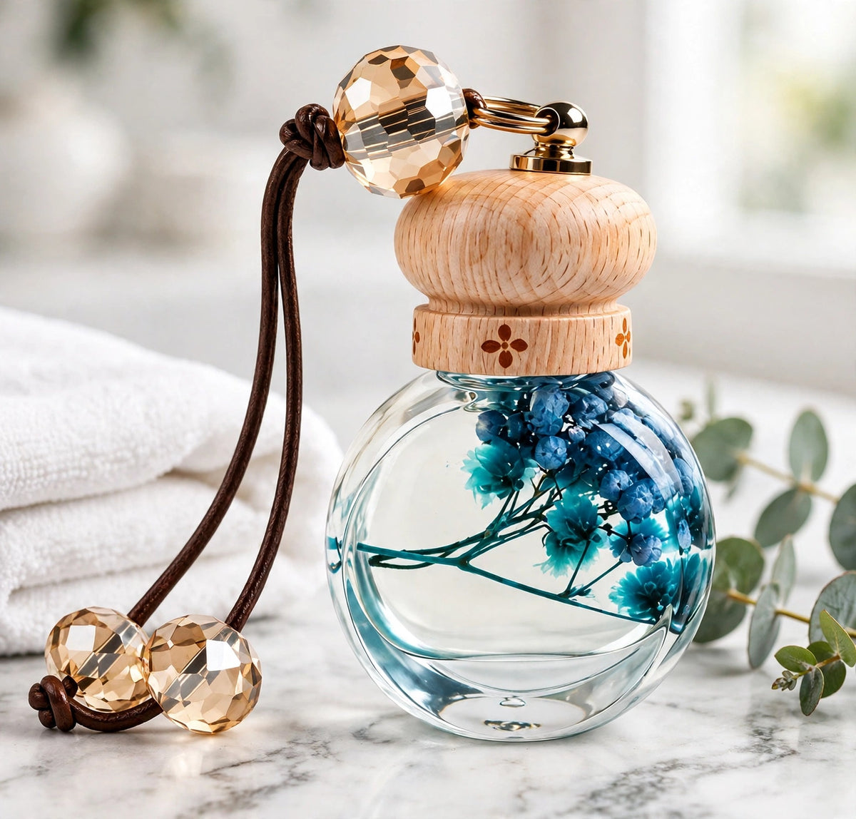 Perfume bottle on a marble bathroom counter