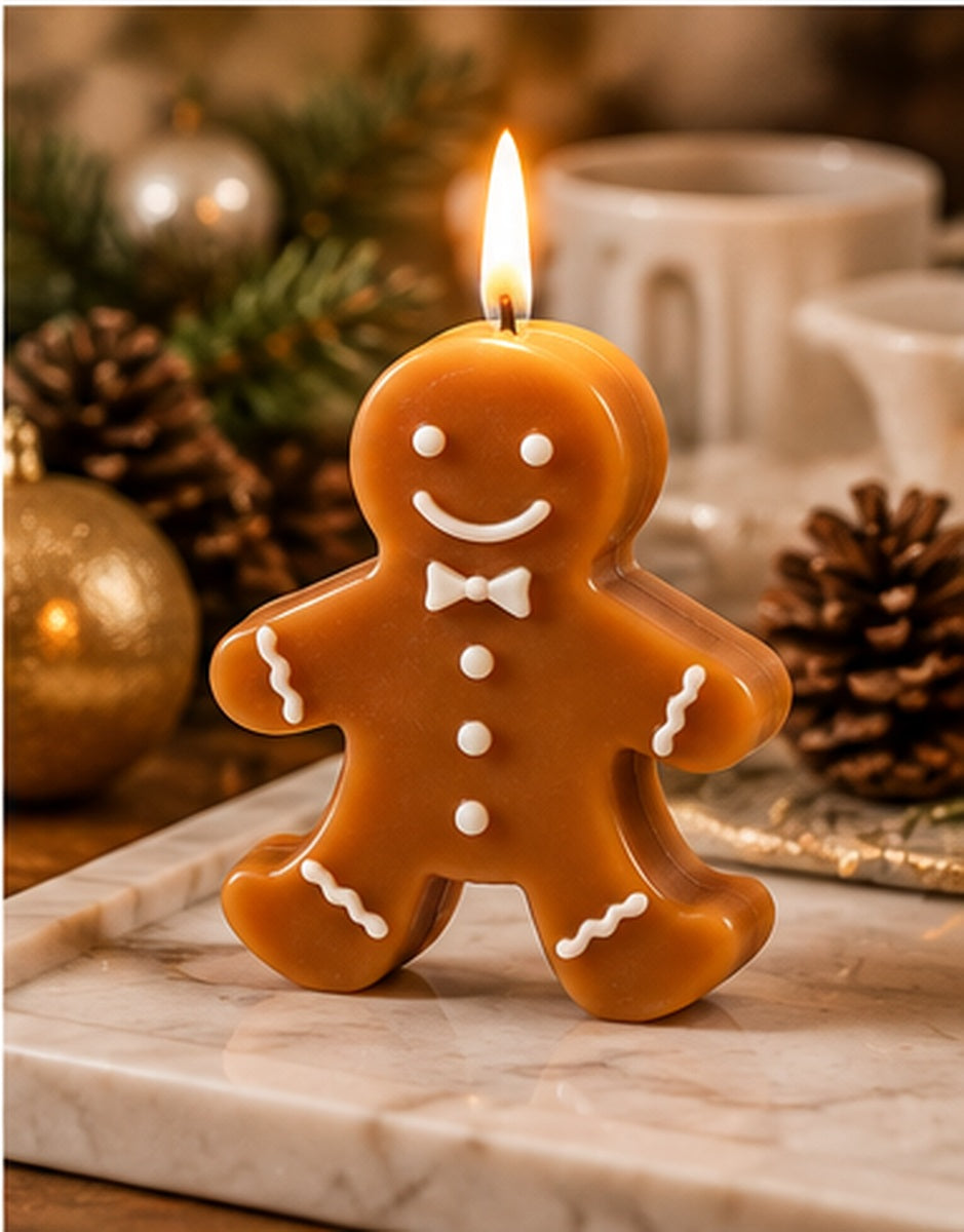 Single lit gingerbread candle